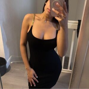 Elegant Black Dress with Gold Accents